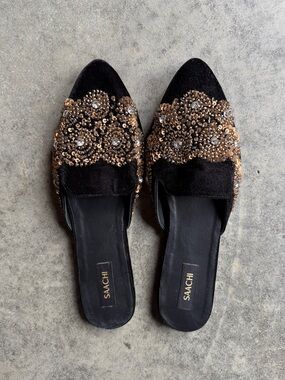 SAACHI Black Slip-On Mules with Gold Sequin Floral Embellish